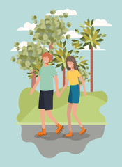 Obraz na płótnie Canvas couple on roller skates in the park