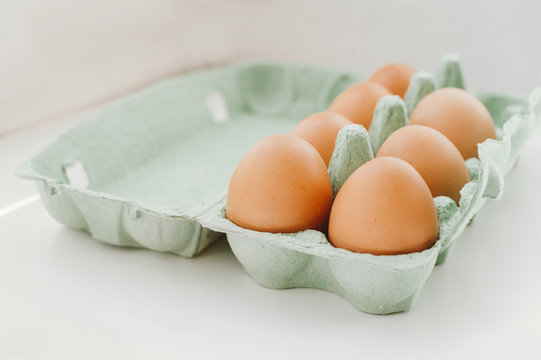Eggs on green tray