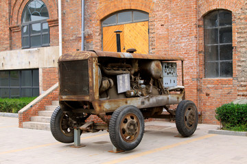 Fototapeta na wymiar nostalgic workshop and old tractor