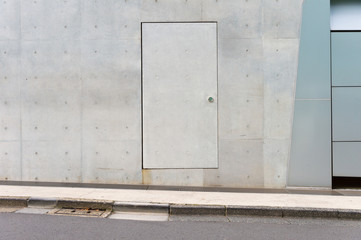 sidewalk by street wall & door