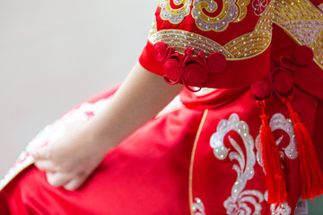 Chinese bride in traditional red dress, close-up