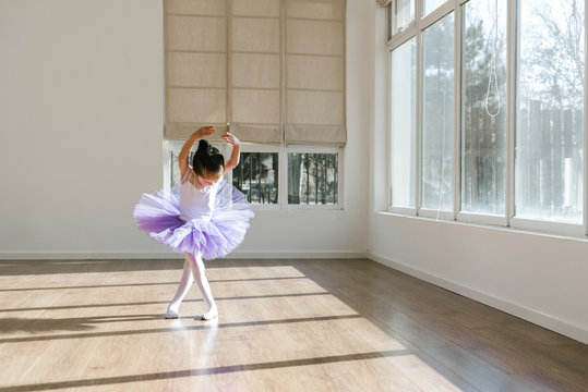 Girl dancing in ballet studio