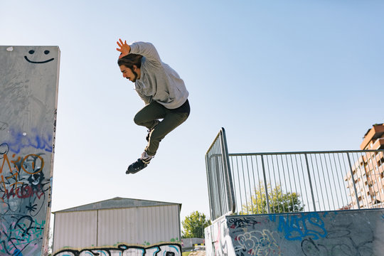 Roller-Skater Man Training at park.