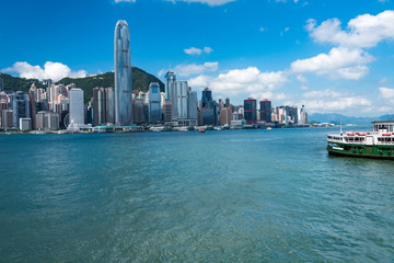 Obraz premium Hong Kong skyline and star ferry terminal at daytime