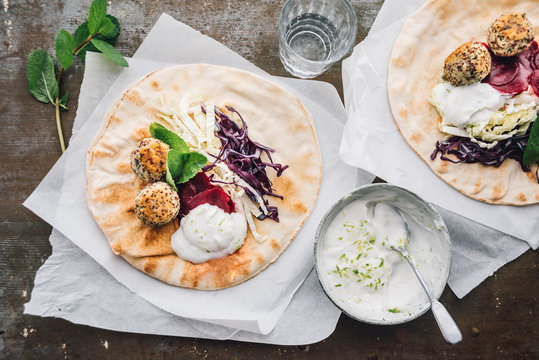 Food: Falafel with quinoa balls, cabbage,onion,beetroot,mint, le