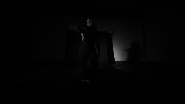 Slow motion shot of modern dancer improvising moment 