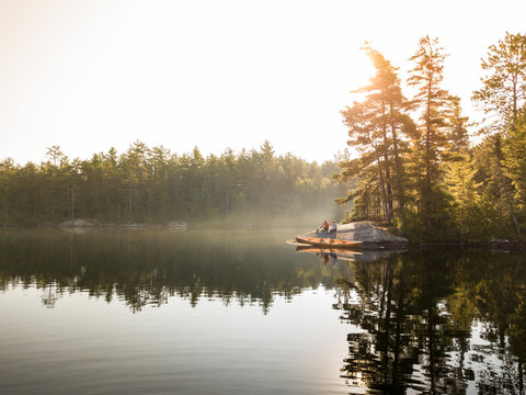 Aerial Image of Father and Son Campsite Breakfast on Wilderness Canoe Trip