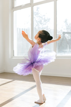 Girl dancing in ballet studio