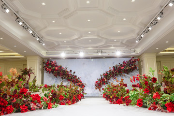The wedding stage decorated with roses