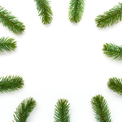 Christmas green framework with fir branches on white background. Top view