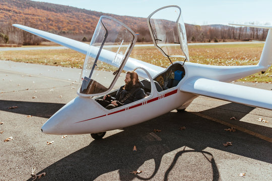 Man waiting take off in a glider plane