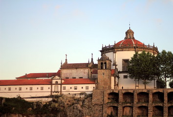 Obraz premium Porto, Portugal. View of Mosteiro de Santo Agostinho da Serra do Pila from the boat on Douro River