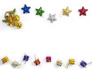 Top view of gifts and star decorations on white  background. Christmas holiday concept
