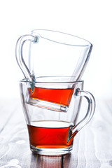 two cups of tea on wooden table. time drink tea. tea concept.