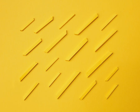 Paper craft french fries over yellow