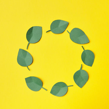 Circle of green leaves from paper