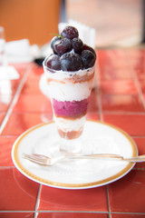 dessert with cream and grapes