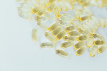 Close up of capsules Omega 3 on white background