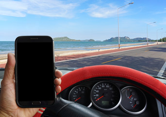 Man parking the car to use smartphone which blank screen, used for road safety concept.