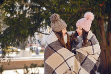 Happy girls in a winter city