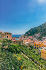 Fototapeta na wymiar Houses of the town of Amalfi, Italy, by mountains and sea