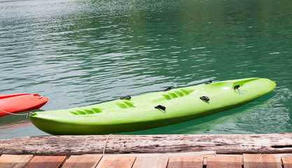 relaxing green canoeing in lake hut resort