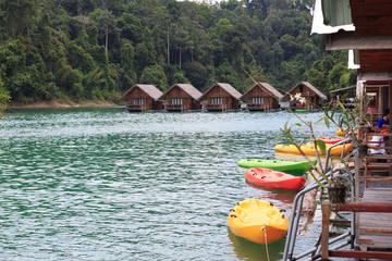 relaxing green canoeing in lake hut resort