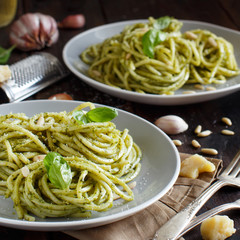 Spaghetti pasta with pesto sauce