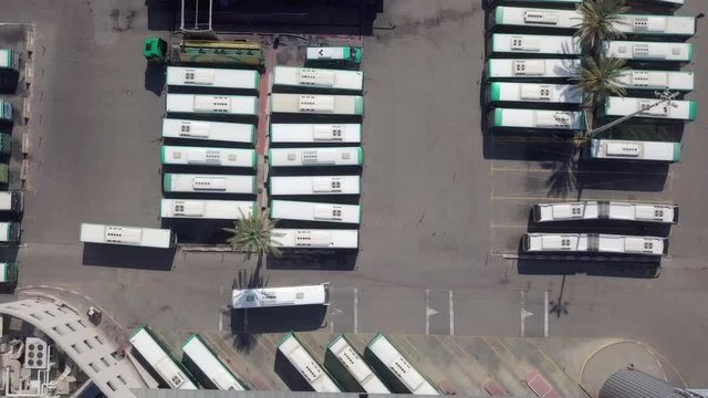 Top down aerial footage of a large Bus terminal