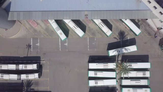 Top down aerial footage of a large Bus terminal
