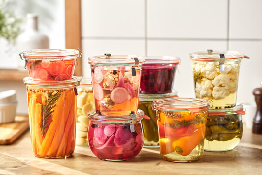 Variety of colorful homemade pickled vegetables.