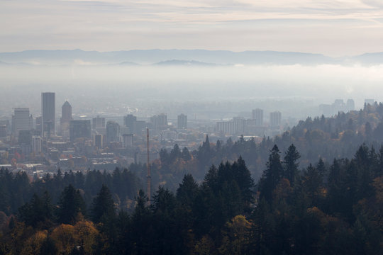 Portland Oregon downtown skyline on a misty autumn morning.
