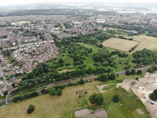 Fototapeta na wymiar Aerial photo of the town of Seacroft near Crossgates in Leeds, showing houses, streets and roads.