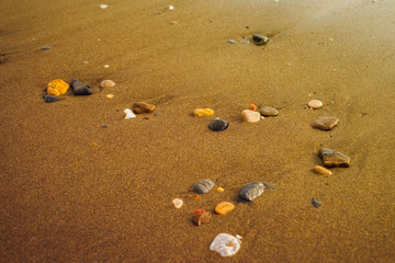 sea sand and stones shore line waterfront background texture