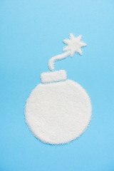 The bomb made of sugar on blue blue background. Diabetes concept. Sugar Kills. Suggesting dieting...