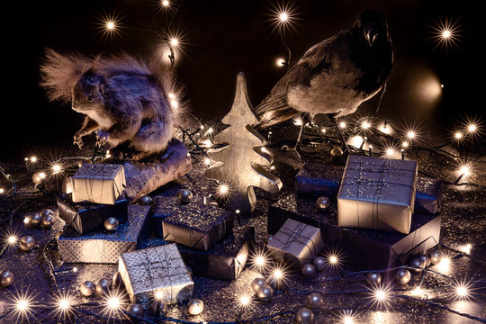 Christmas gifts and golden tree with glitter and stuffed animals