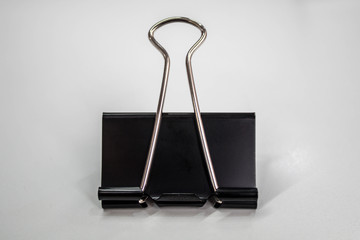Black Paper clip on white background , Binder clip 