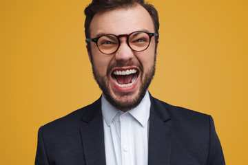 Screaming stressed businessman