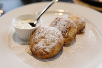 Plate with cottage cheese pancakes