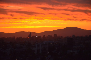 Fototapeta premium Sunset clouds and cityscape