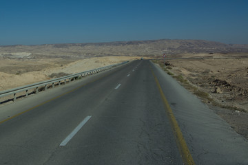 Wide view of desert road through the Isreal southwest.