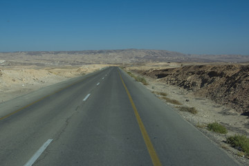 Wide view of desert road through the Isreal southwest.