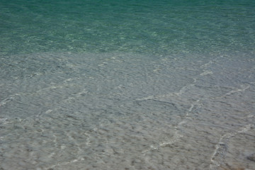 Close up view of salt crystals and mineral formation on the shore of Dead Sea in Israel, health and beauty care. Sharp surface, natural pattern