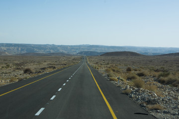 Wide view of desert road through the Isreal southwest.