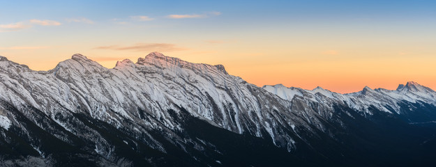 Stunning sunset of snow capped Canadian Rocky mountains at Banff National Park in Alberta, Canada © boonsom