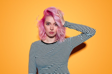 Trendy millennial woman with pink hair