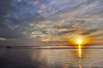 Golden hour in Thailand, boat on the foreground of magic sunrise