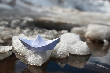 paper boat in a pool