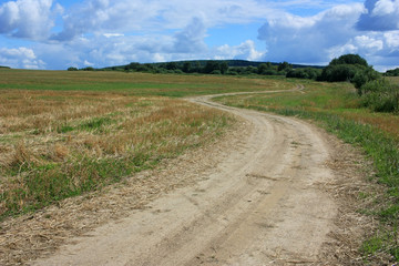 Fototapeta na wymiar Dirt country road deserted