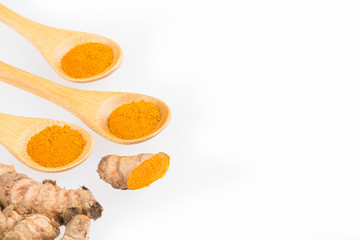 Turmeric powder and fresh turmeric - Curcuma longa.